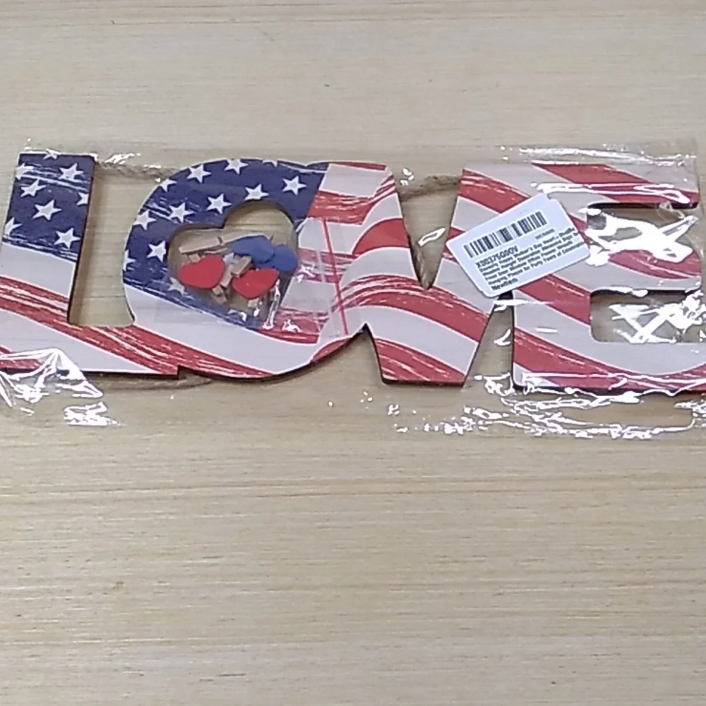 Wooden sign Love in red, white & blue. 11.5 x 4.5 inches w heart picture clips
